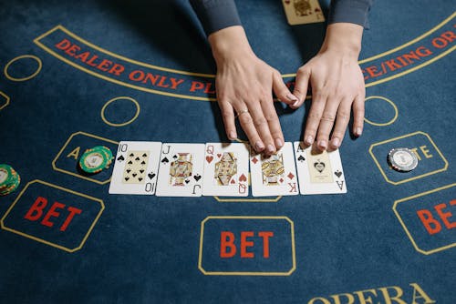 https://www.pexels.com/photo/slot-machines-rows-on-table-1234567